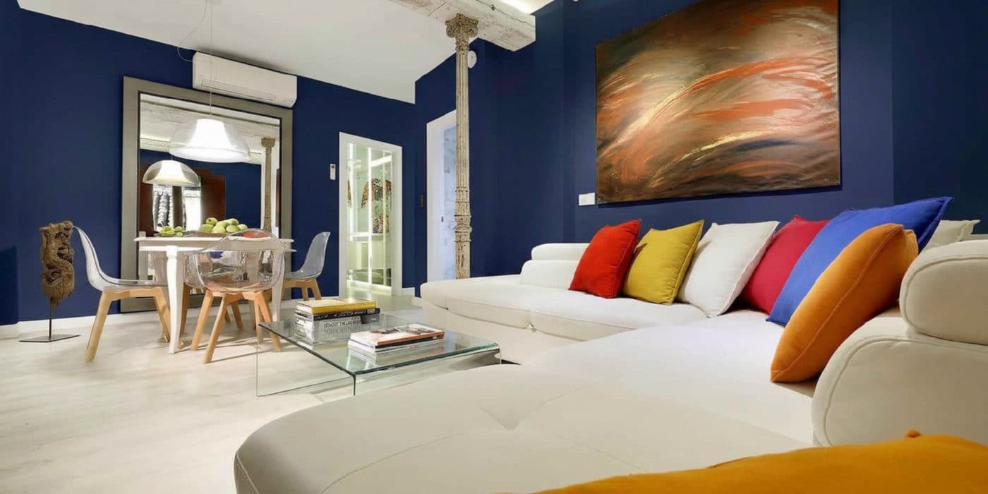 The bright living room virtually repainted Dark Navy
